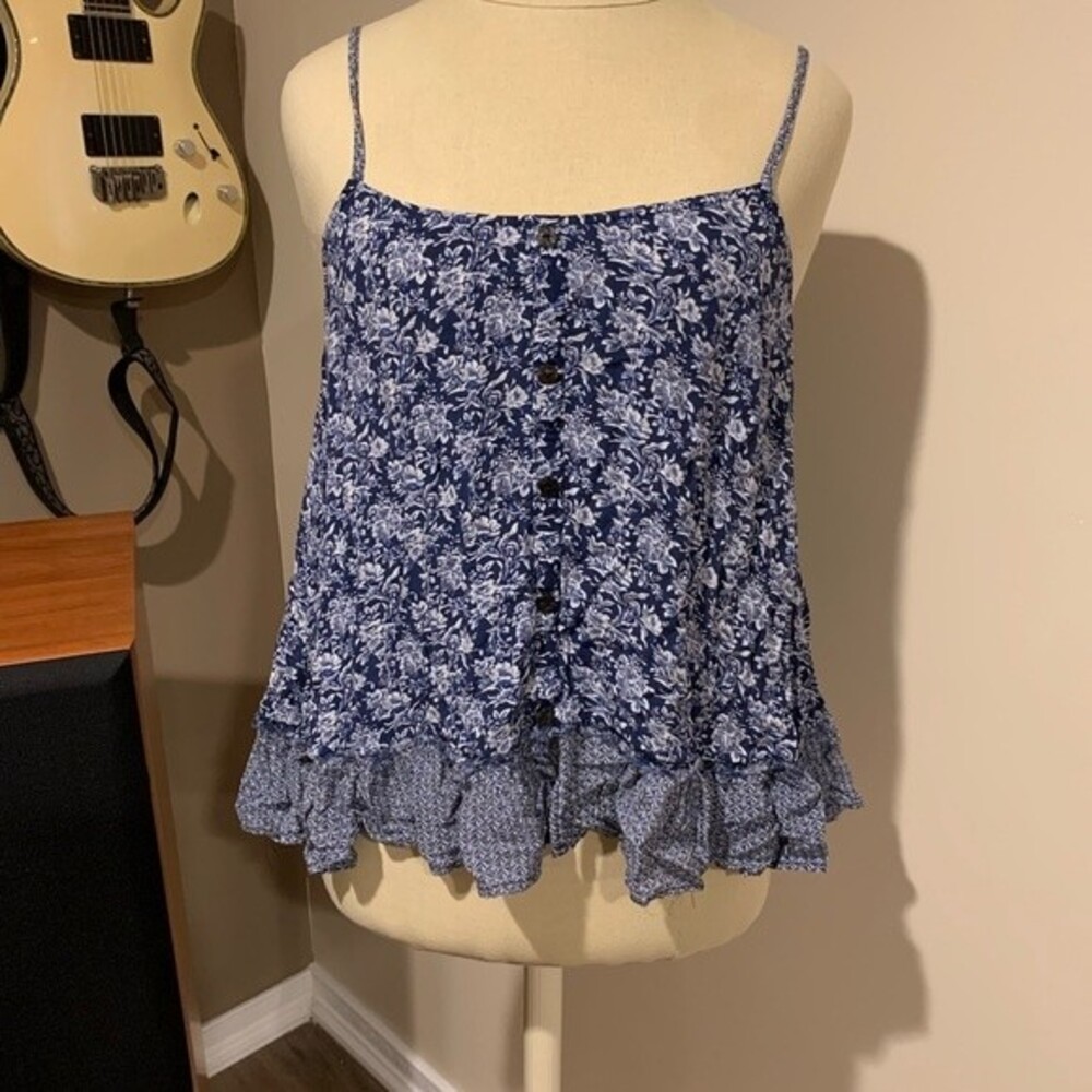 Hem and Tread loose flowing shirt with adjustable spaghetti straps. Buttons down